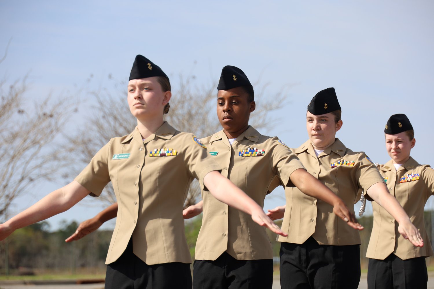 The Nease NJROTC Unarmed Exhibition Drill Team competes under the watchful eye of a Marine Corps judge during the Area 12 Championships on March 4 in Douglas, Georgia. The unit claimed first place in this event. Nease Navy JROTC won the championship for the ninth consecutive year.